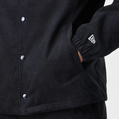 The Male model is wearing  New Era Cord Black Coaches Jacket  7