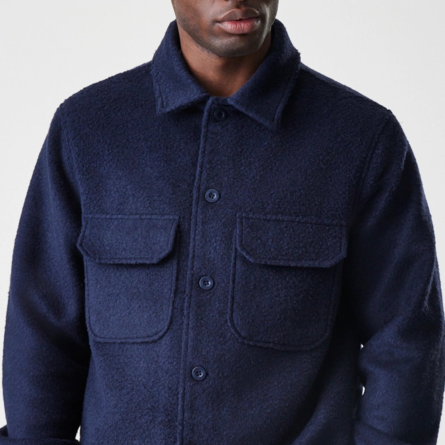 The Male model is wearing  New Era Borg Navy Shacket 3