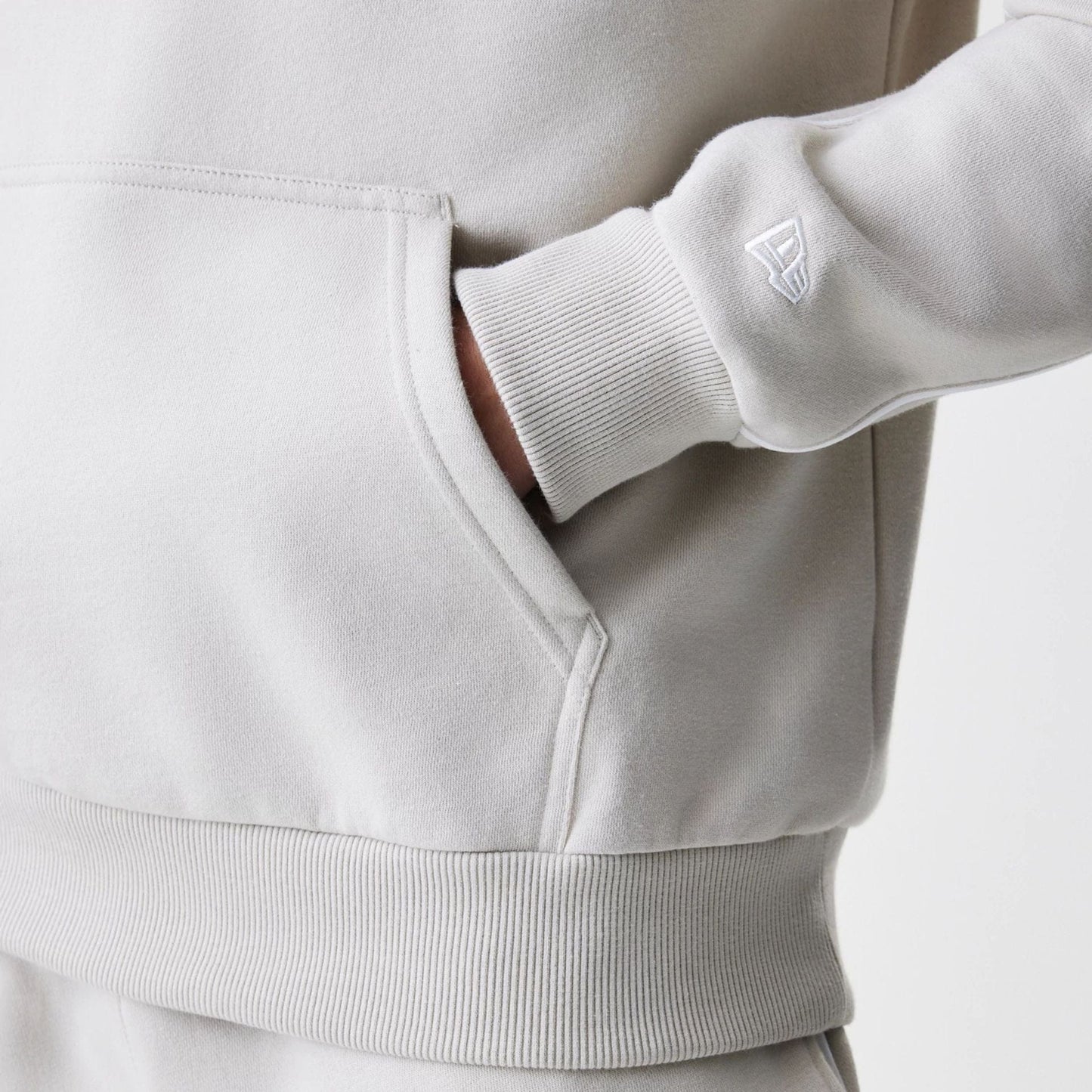 The Male model is wearing LA Lakers NBA Piping Cream Oversized Pullover Hoodie  5