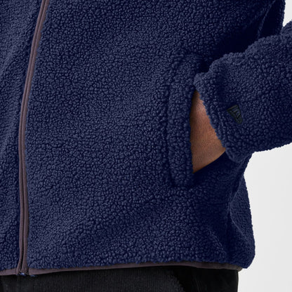 The Male model is wearing  New Era Navy Hooded Sherpa Jacket  7