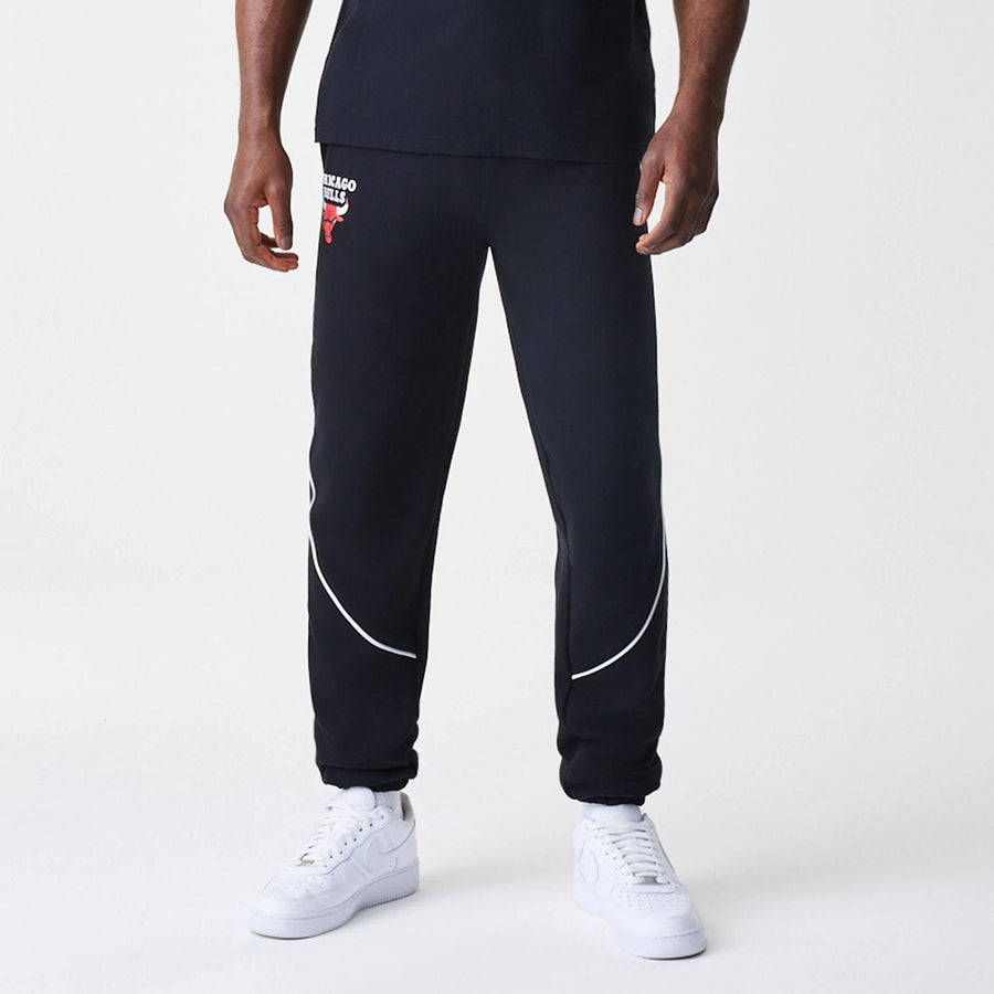 The Male model is wearing Chicago Bulls NBA Piping Navy Joggers  6
