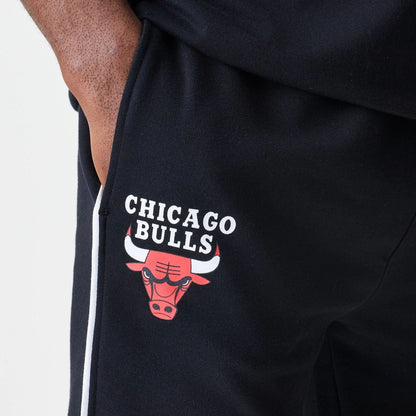 The Male model is wearing Chicago Bulls NBA Piping Navy Joggers  3