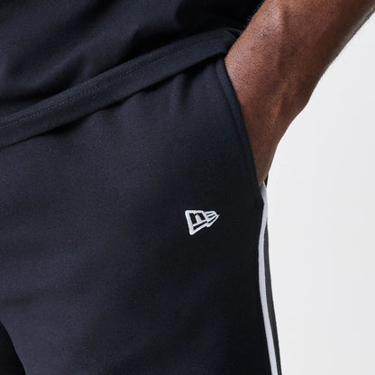 The Male model is wearing Chicago Bulls NBA Piping Navy Joggers  4