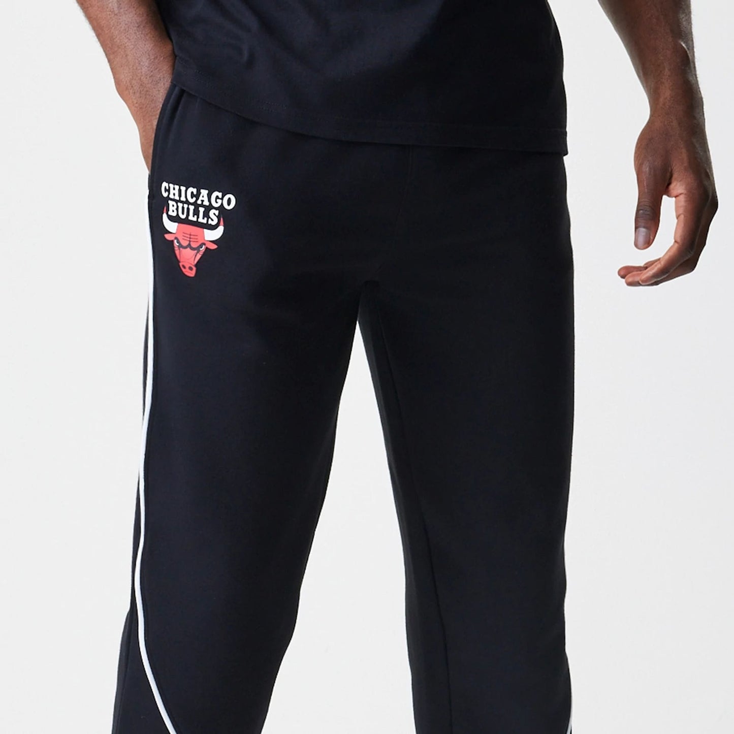 The Male model is wearing Chicago Bulls NBA Piping Navy Joggers  5
