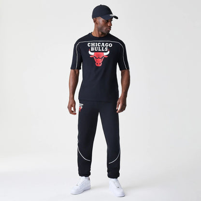 The Male model is wearing Chicago Bulls NBA Piping Navy Joggers  8