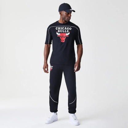 The Male model is wearing Chicago Bulls NBA Piping Navy Joggers 8