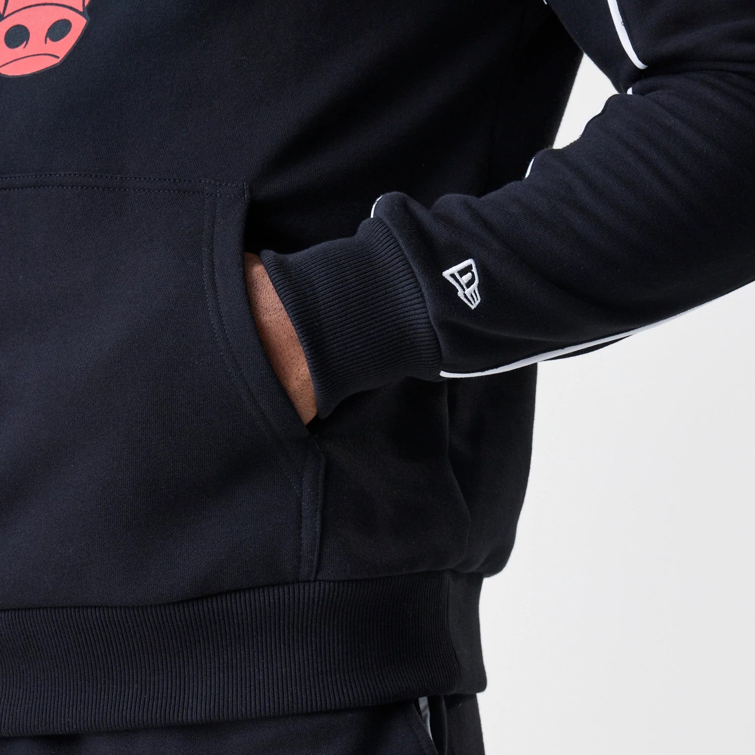 The Male model is wearing Chicago Bulls NBA Piping Black Oversized Pullover Hoodie 4