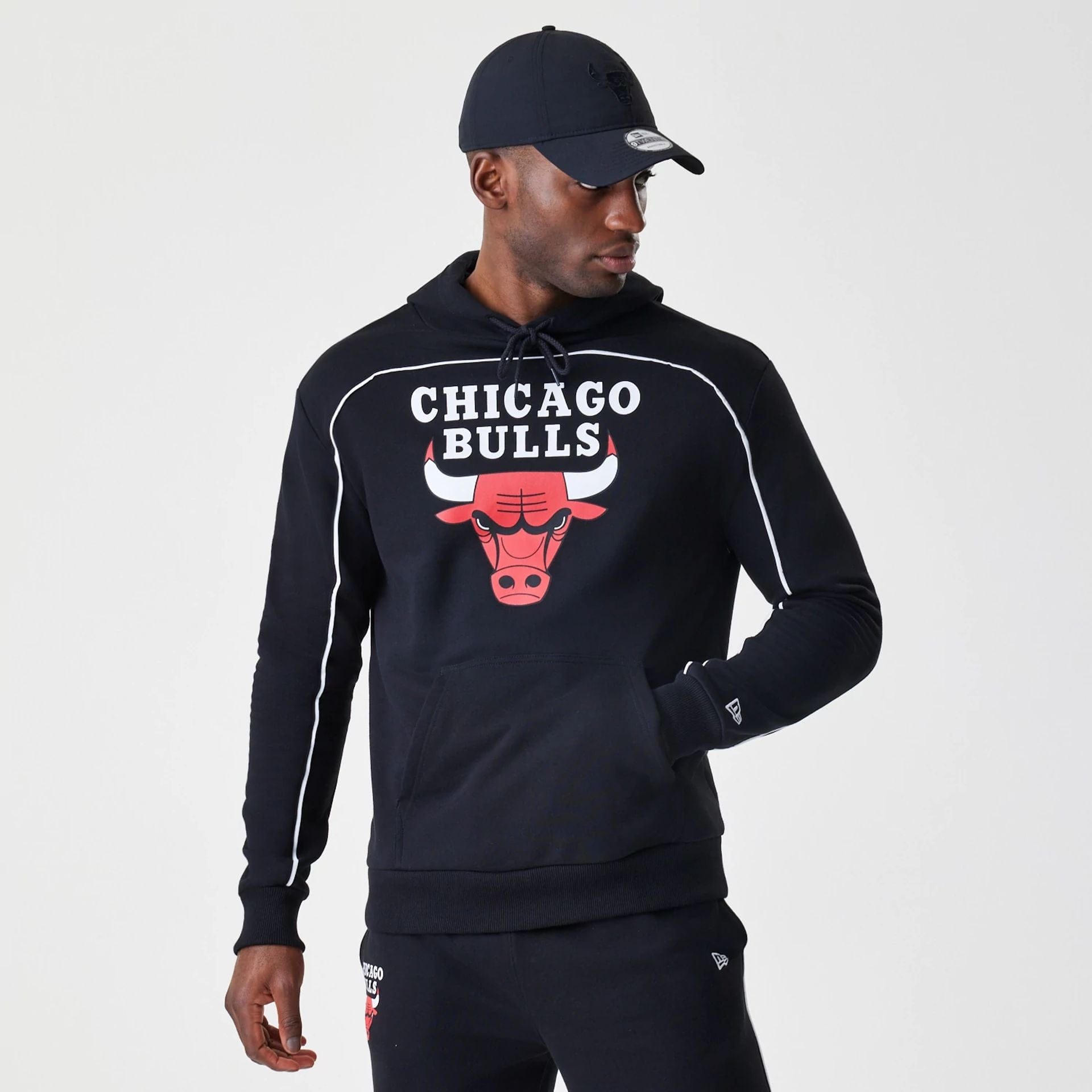 The Male model is wearing Chicago Bulls NBA Piping Black Oversized Pullover Hoodie  1