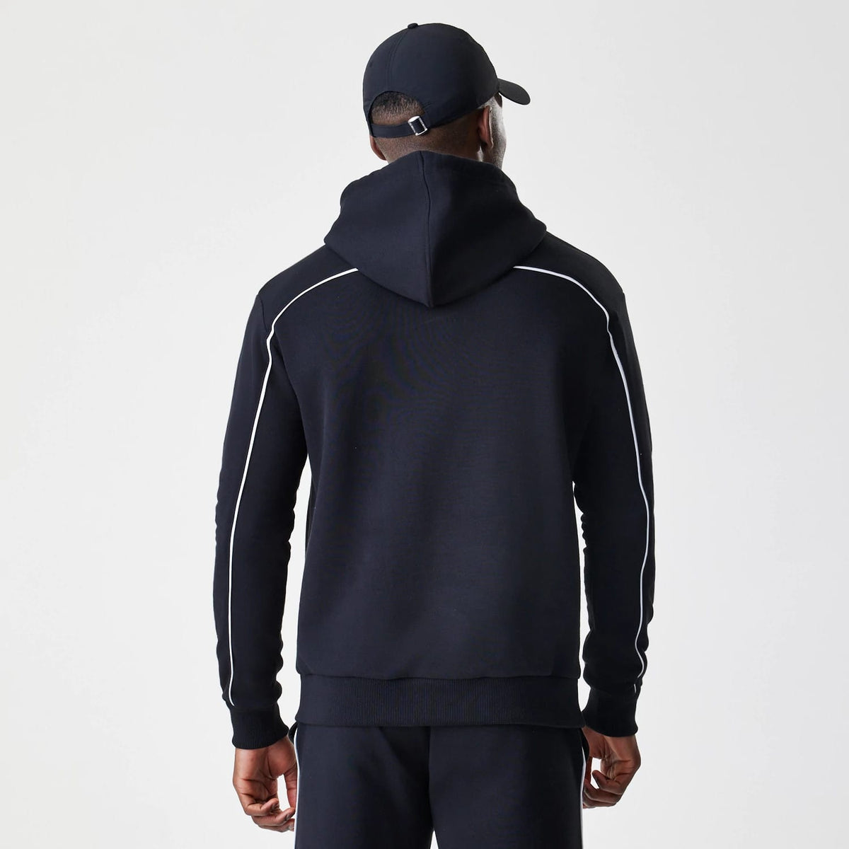 The Male model is wearing Chicago Bulls NBA Piping Black Oversized Pullover Hoodie 2