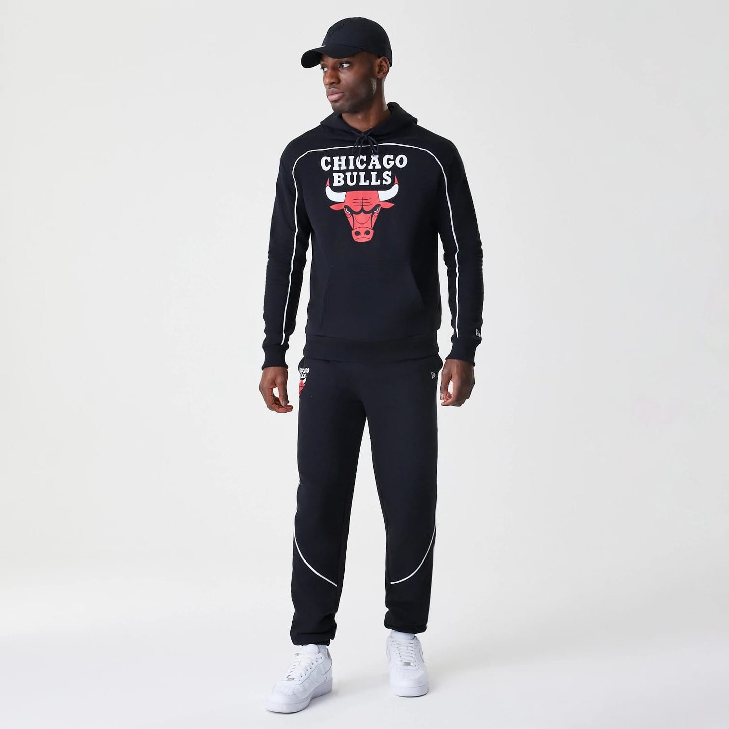 The Male model is wearing Chicago Bulls NBA Piping Black Oversized Pullover Hoodie 8
