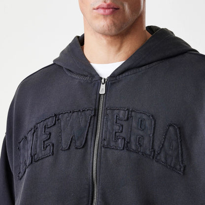 The Male model is wearing  New Era Washed Black Oversized Full Zip Hoodie 5