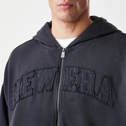 The Male model is wearing  New Era Washed Black Oversized Full Zip Hoodie 5
