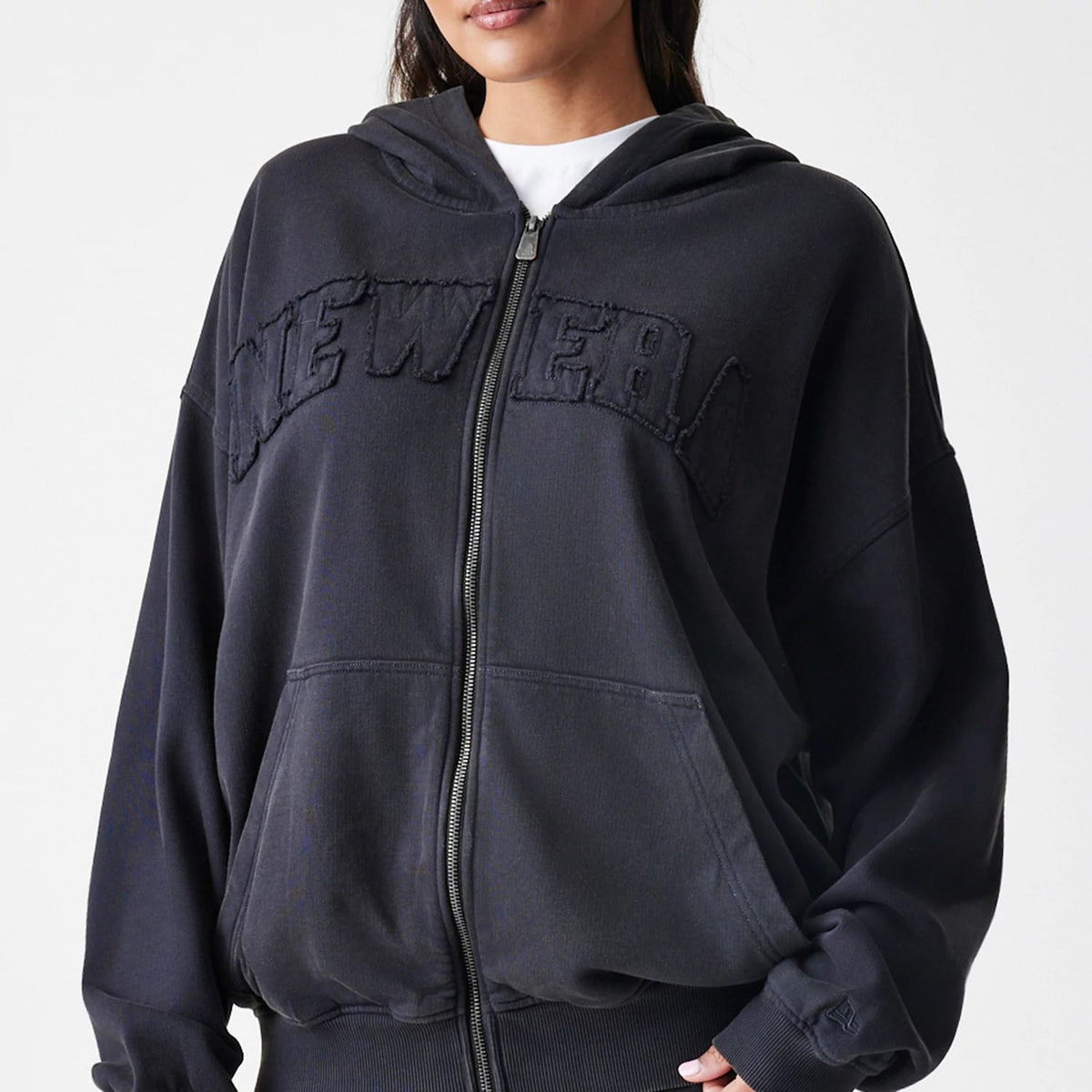 The Male model is wearing  New Era Washed Black Oversized Full Zip Hoodie 6