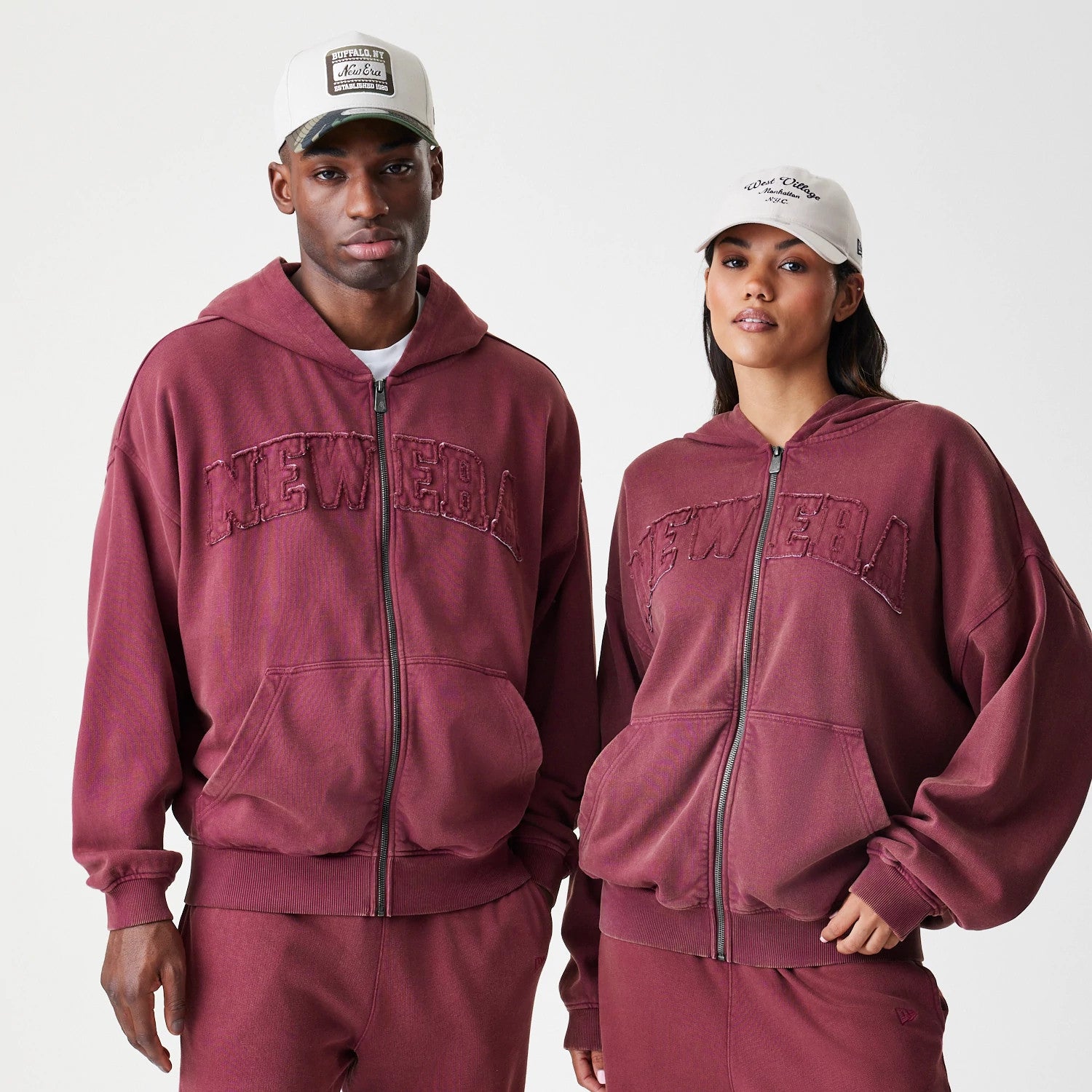 The Male model is wearing  New Era Washed Dark Red Oversized Full Zip Hoodie 1