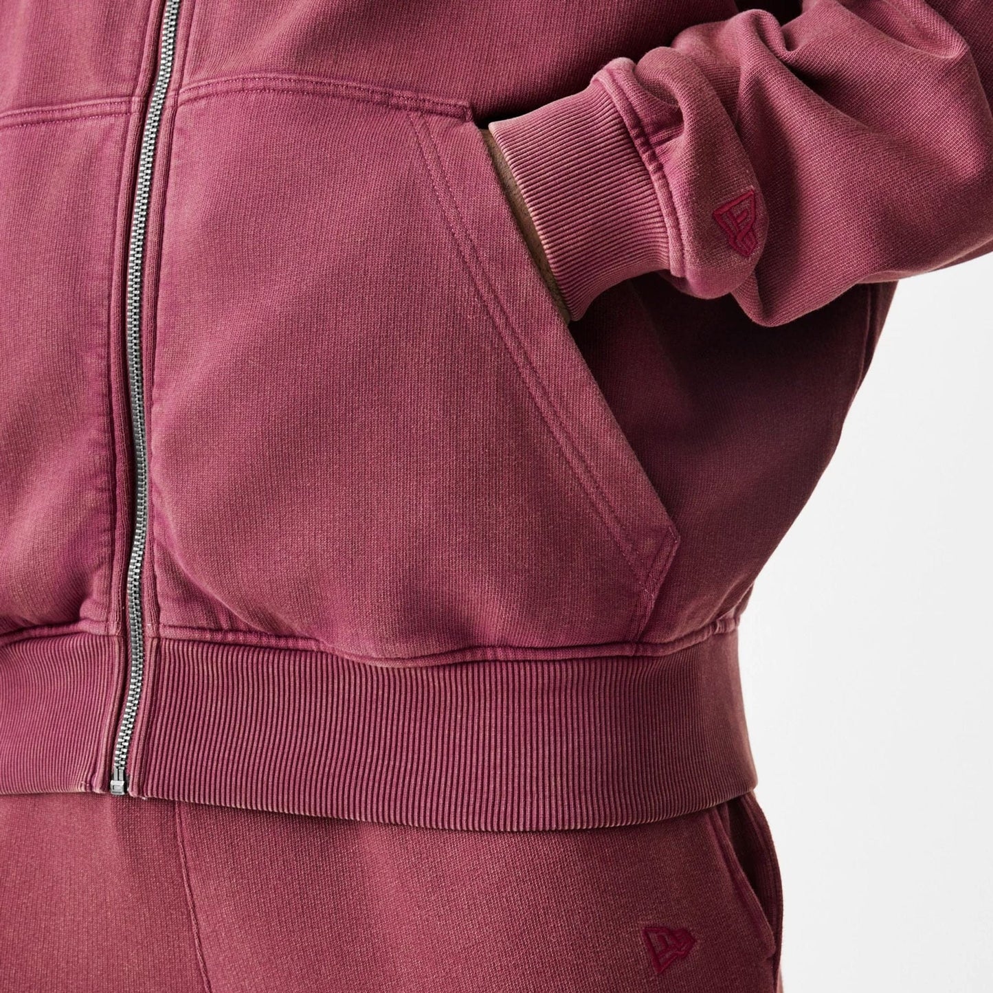 The Male model is wearing  New Era Washed Dark Red Oversized Full Zip Hoodie  7