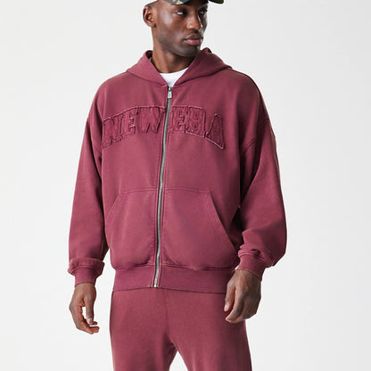 The Male model is wearing  New Era Washed Dark Red Oversized Full Zip Hoodie 8