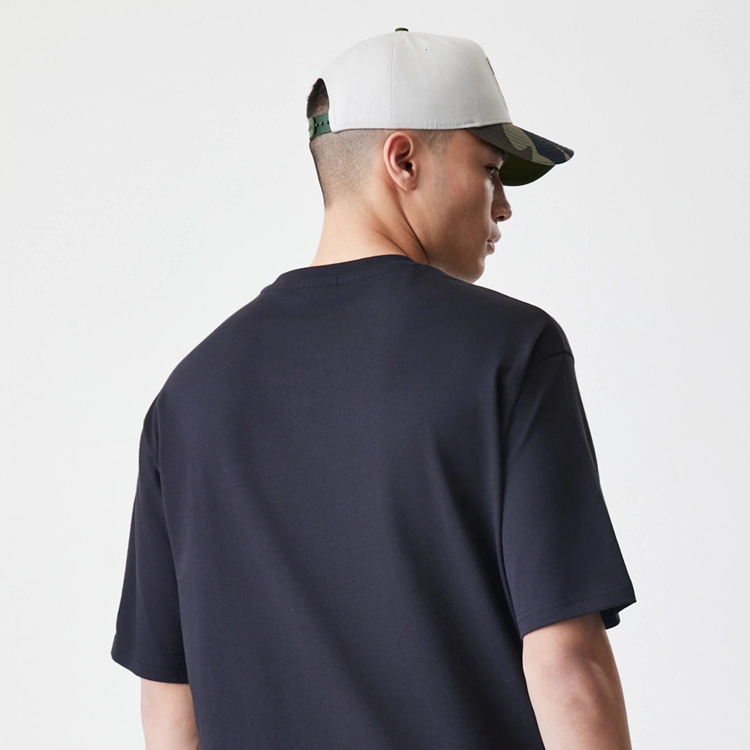 The Male model is wearing  New Era Floral Black Oversized T-Shirt 7