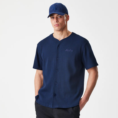 The Male model is wearing  New Era Waffle Navy Jersey 3