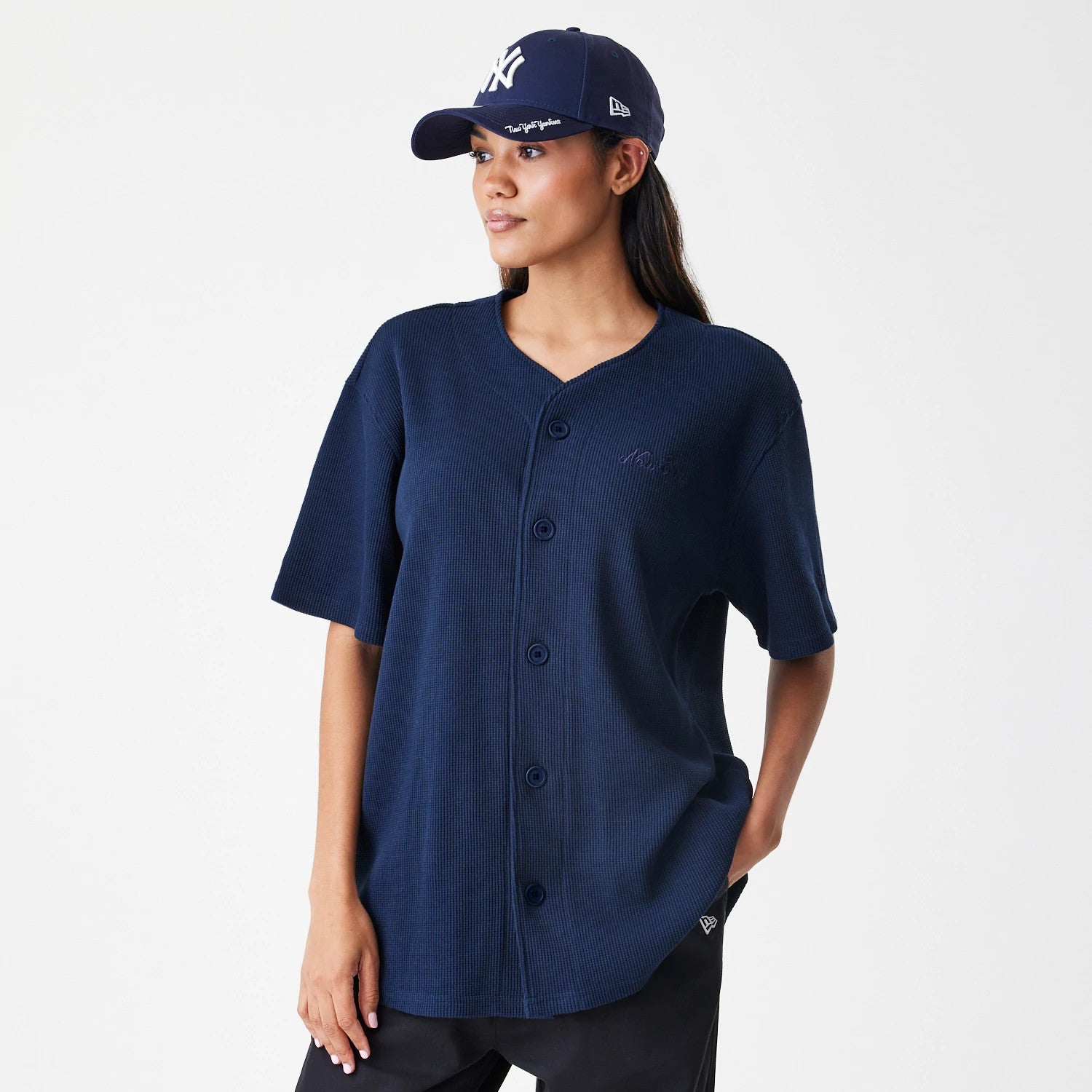 The Male model is wearing  New Era Waffle Navy Jersey 4