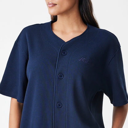 The Male model is wearing  New Era Waffle Navy Jersey 6