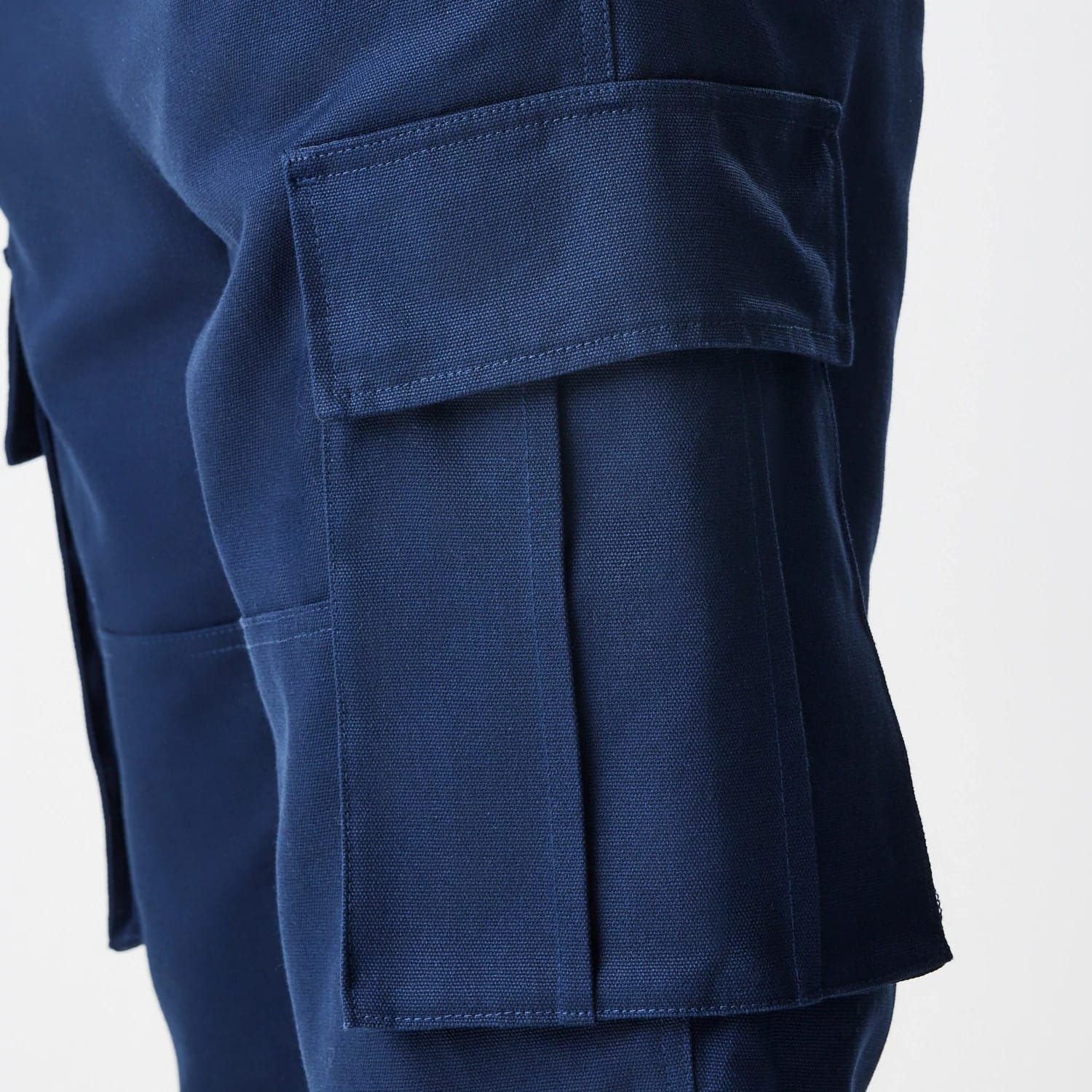 The Male model is wearing  New Era Navy Straight Leg Cargo Trousers 4