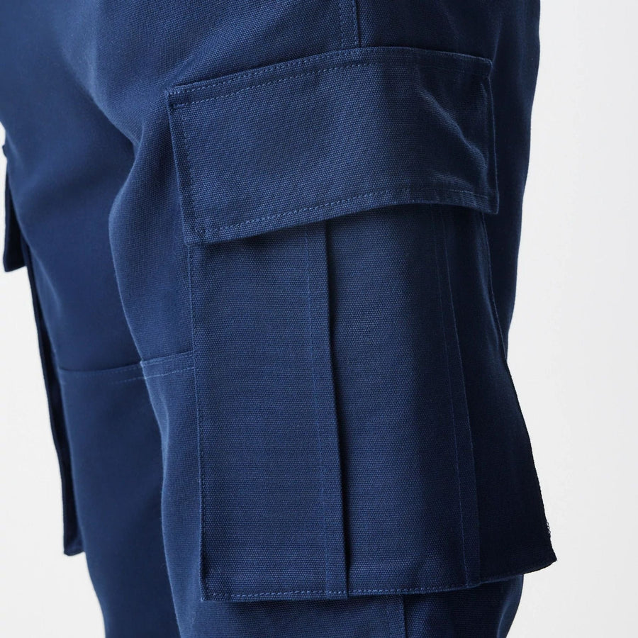 The Male model is wearing  New Era Navy Straight Leg Cargo Trousers  4