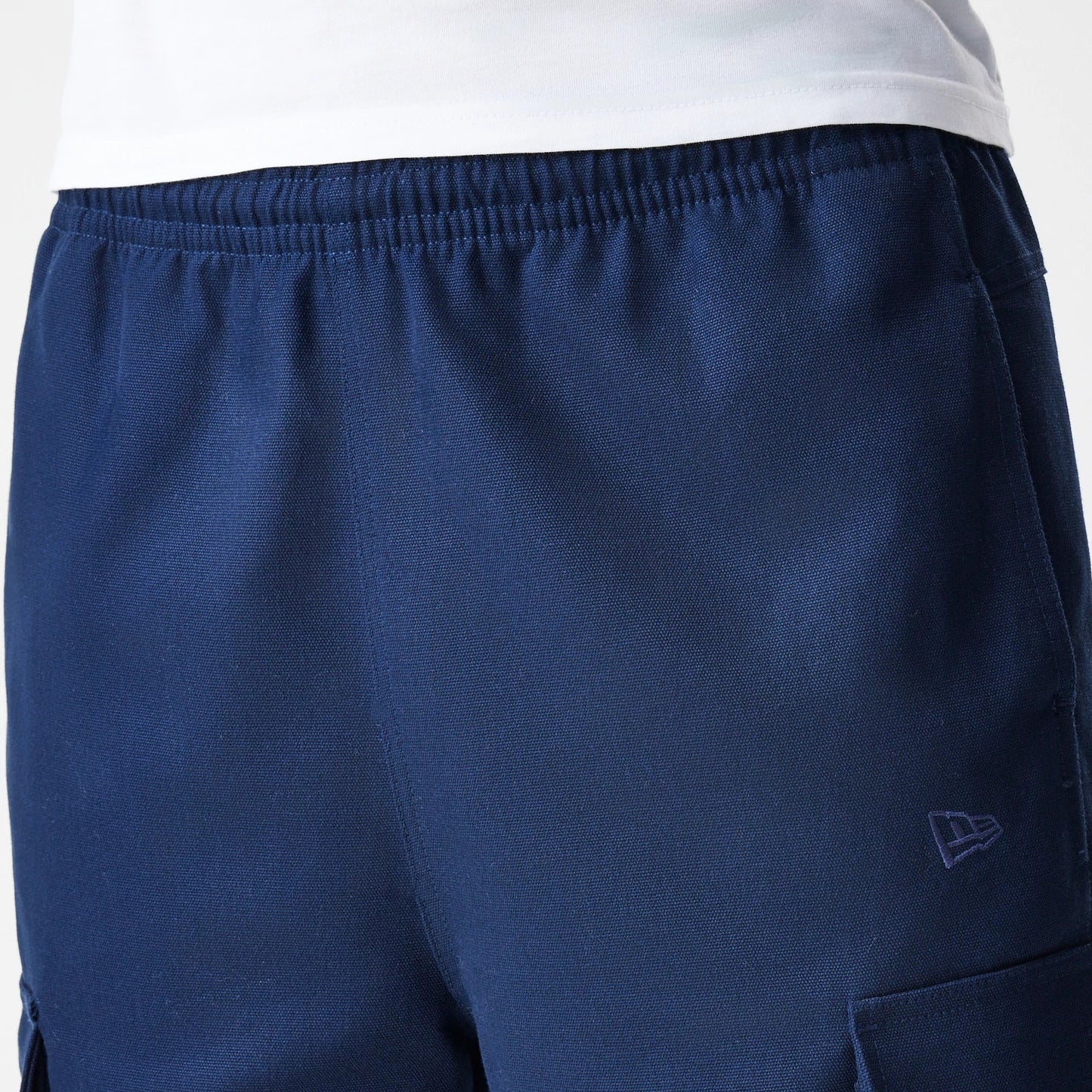 The Male model is wearing  New Era Navy Straight Leg Cargo Trousers 6