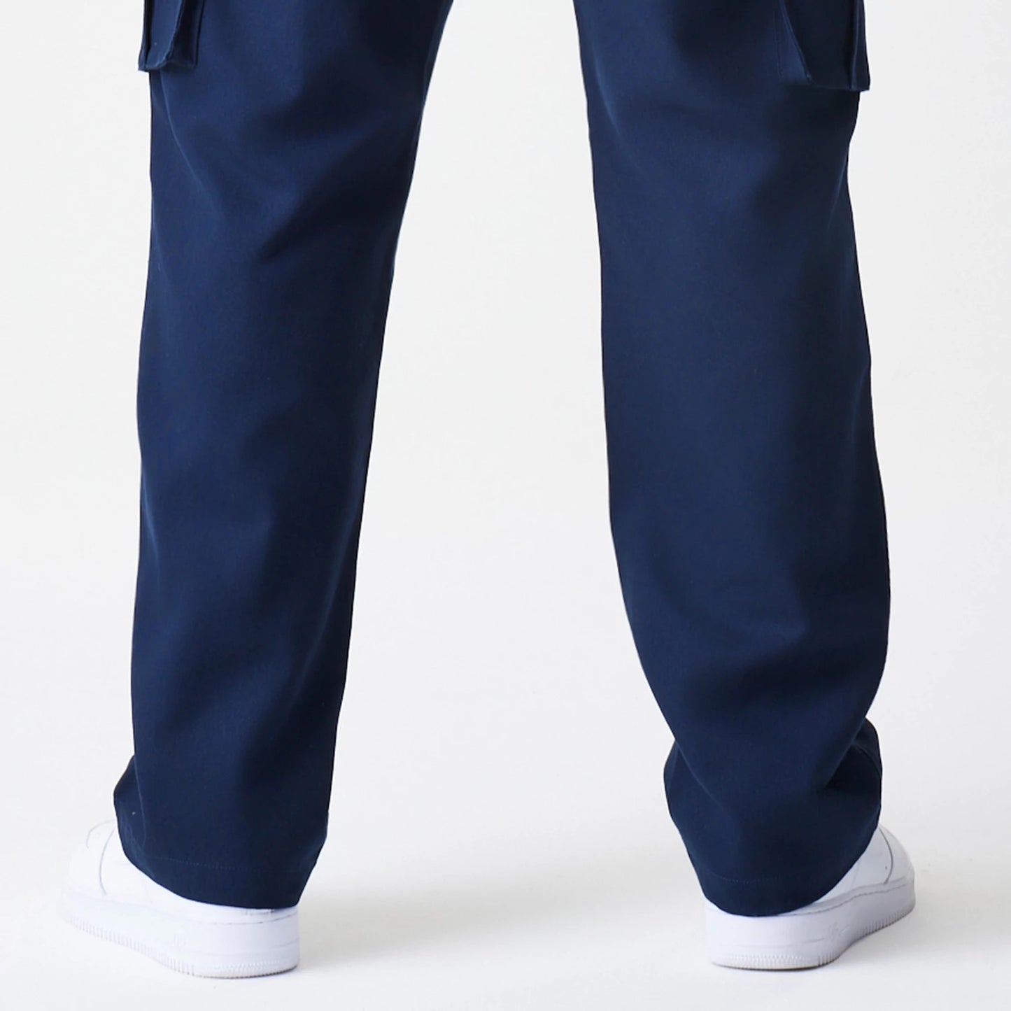 The Male model is wearing  New Era Navy Straight Leg Cargo Trousers 7