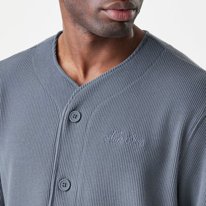 The Male model is wearing  New Era Waffle Dark Grey Jersey  6