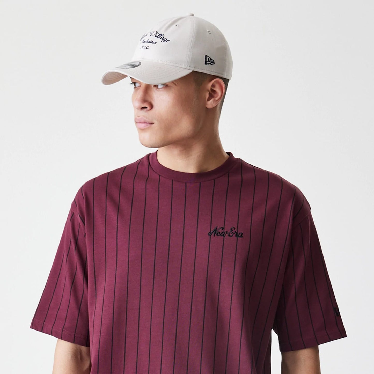 The Male model is wearing  New Era Pinstripe Dark Red Oversized T-Shirt 6