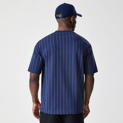 The Male model is wearing  New Era Pinstripe Navy Oversized T-Shirt 2