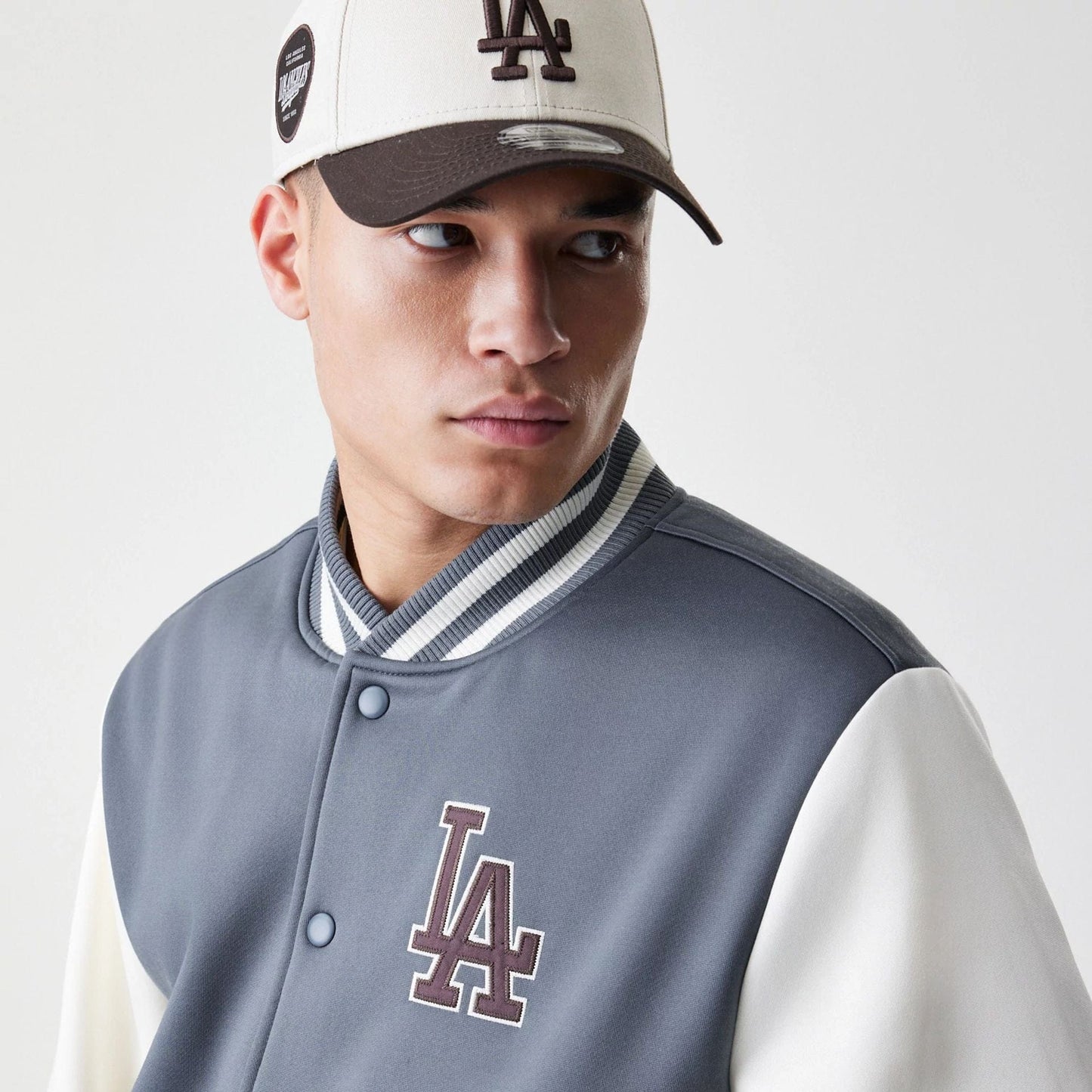 The Male model is wearing LA Dodgers MLB Dark Grey Varsity Jacket  5