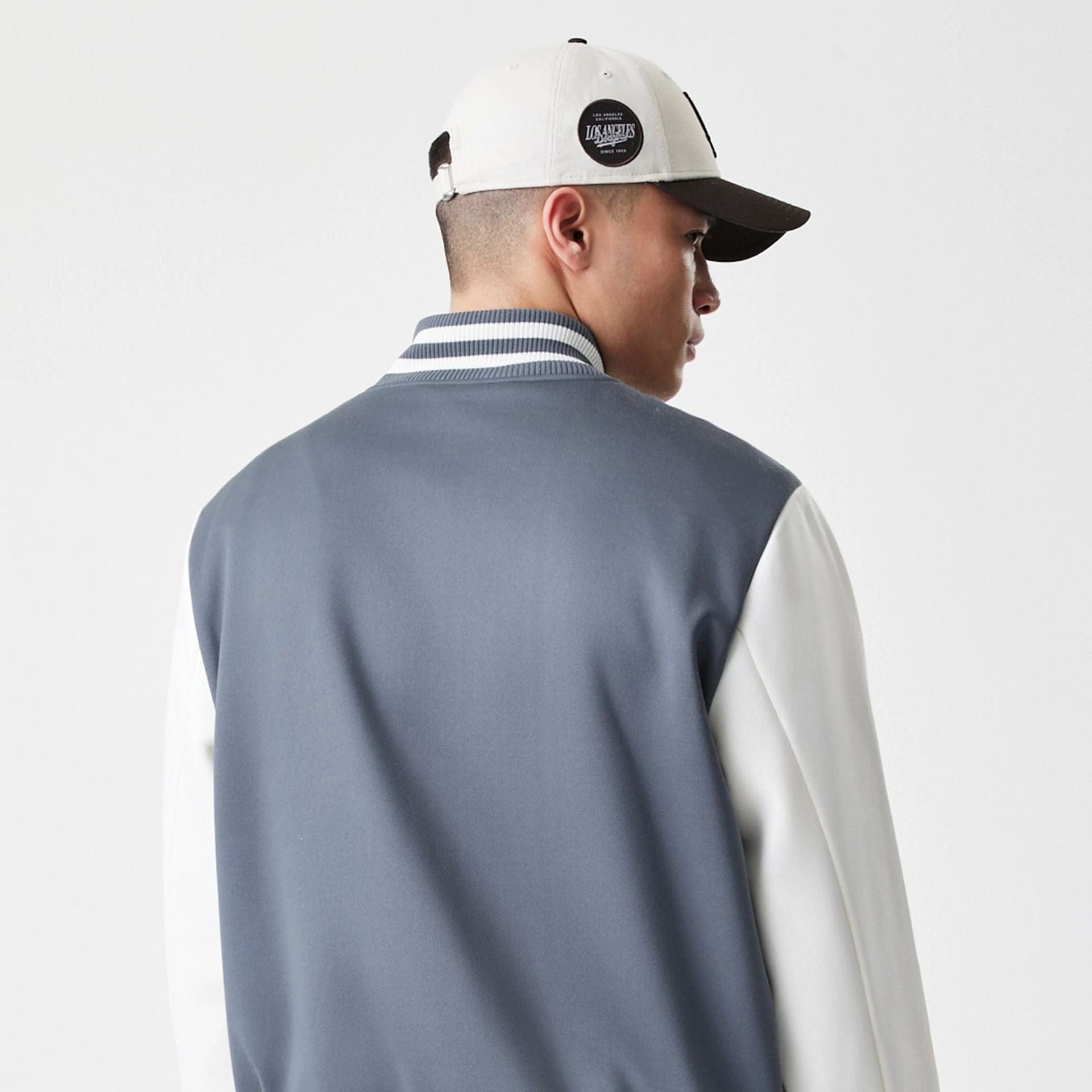 The Male model is wearing LA Dodgers MLB Dark Grey Varsity Jacket  7