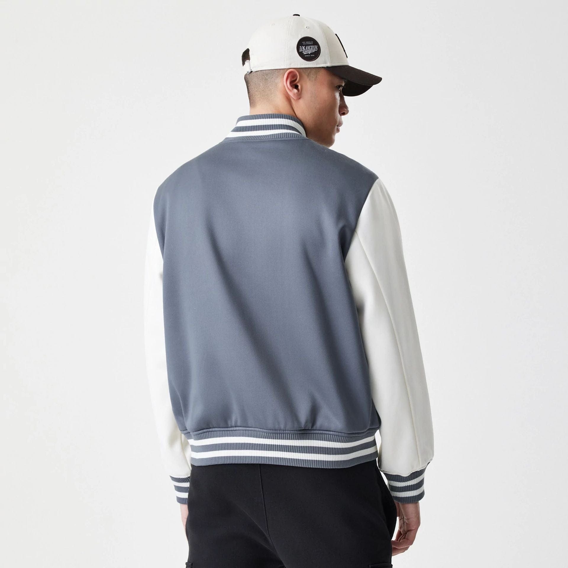 The Male model is wearing LA Dodgers MLB Dark Grey Varsity Jacket  2