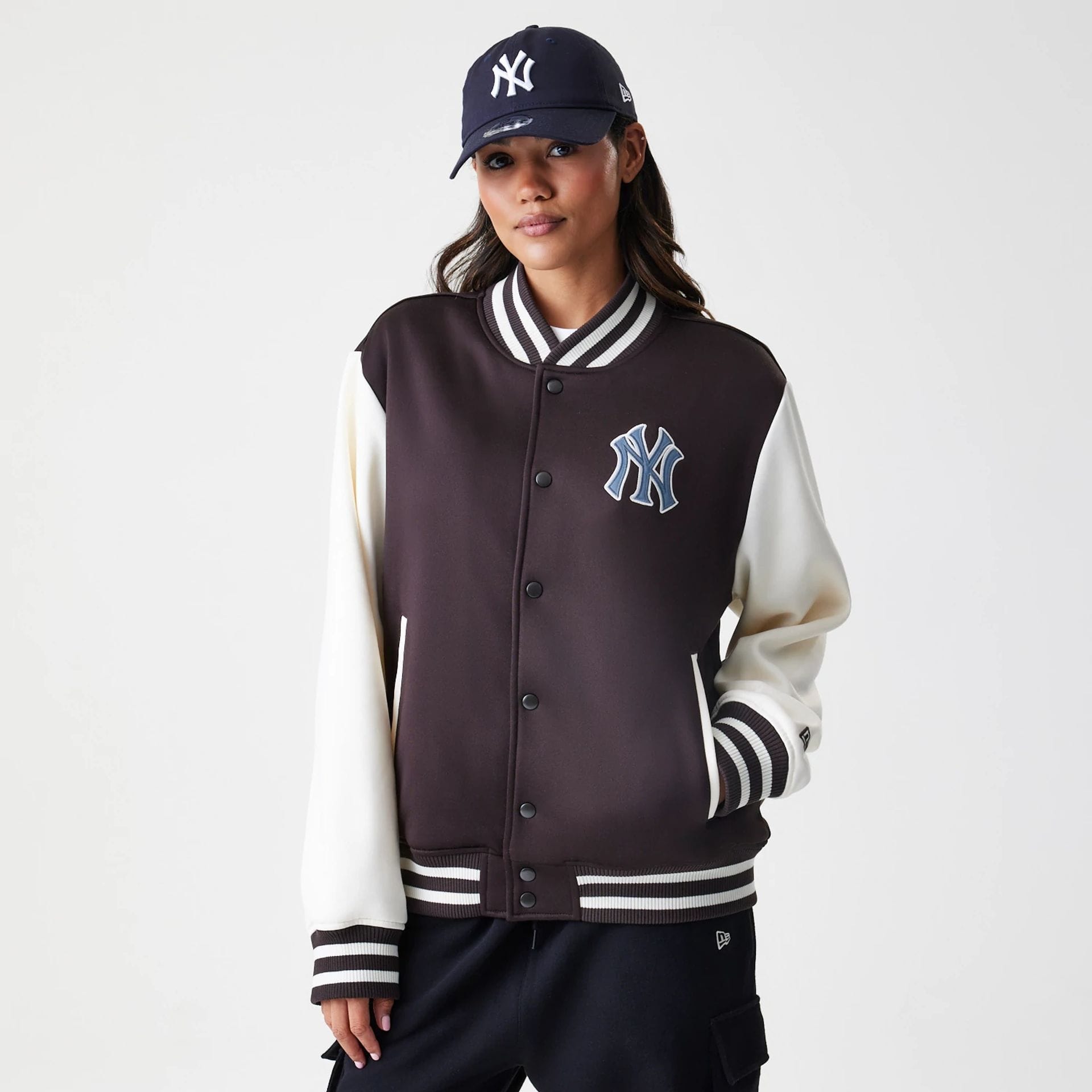 The Male model is wearing New York Yankees MLB Dark Brown Varsity Jacket 4