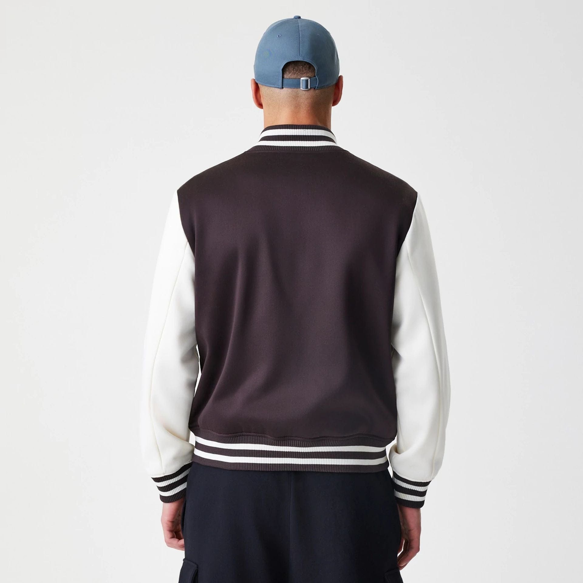 The Male model is wearing New York Yankees MLB Dark Brown Varsity Jacket  2