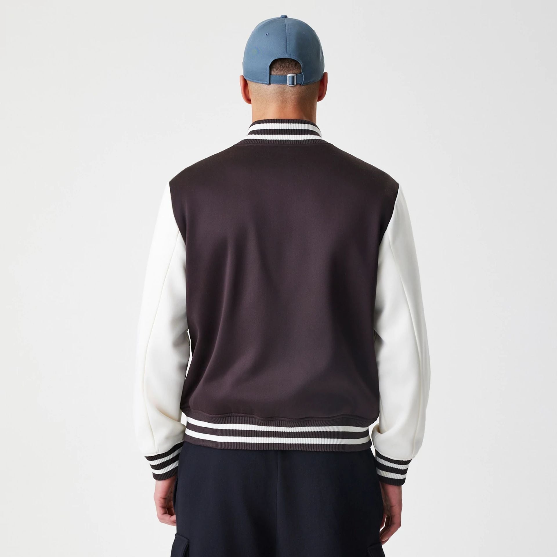 The Male model is wearing New York Yankees MLB Dark Brown Varsity Jacket  2