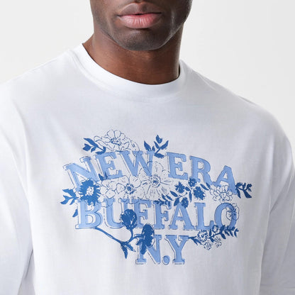 The Male model is wearing  New Era Floral White Oversized T-Shirt 5