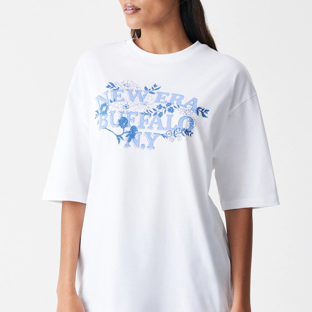 The Male model is wearing  New Era Floral White Oversized T-Shirt 6