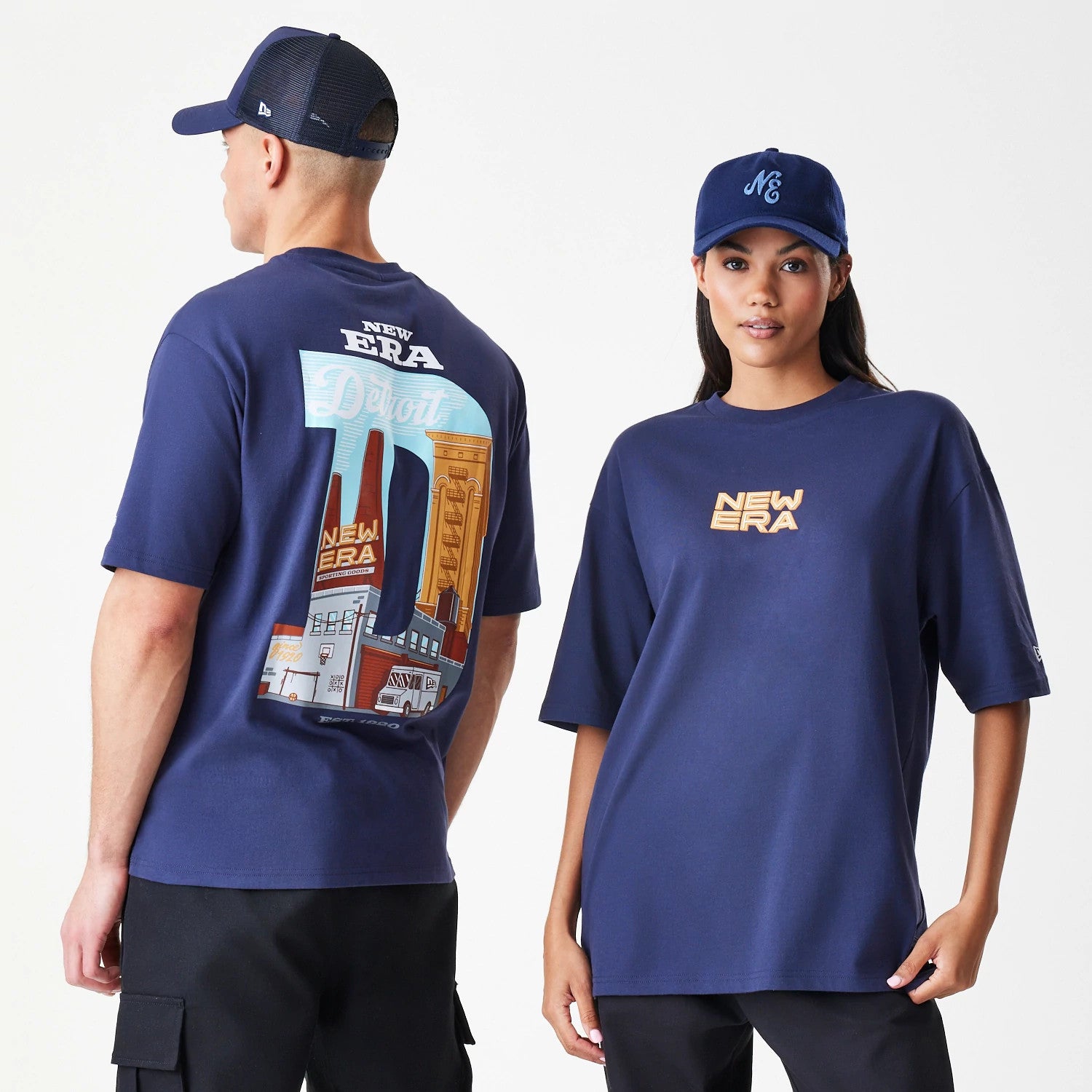 The Male model is wearing  New Era Location Navy Oversized T-Shirt 1