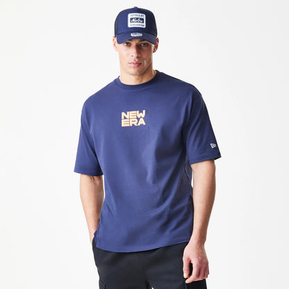 The Male model is wearing  New Era Location Navy Oversized T-Shirt 3