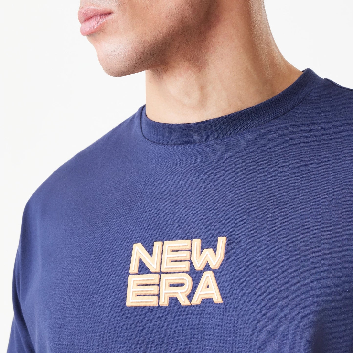 The Male model is wearing  New Era Location Navy Oversized T-Shirt 5