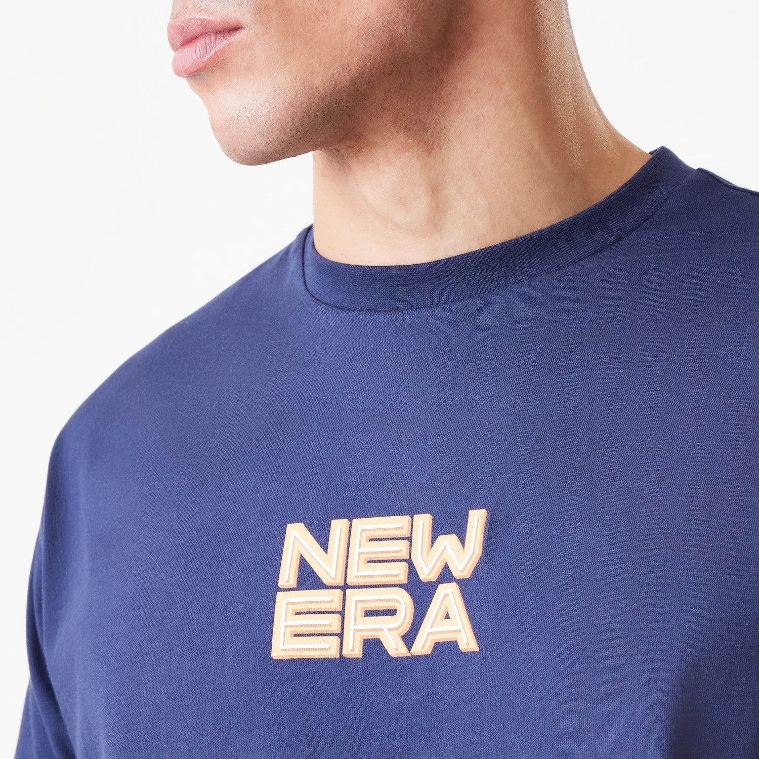 The Male model is wearing  New Era Location Navy Oversized T-Shirt 5