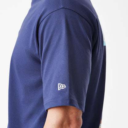 The Male model is wearing  New Era Location Navy Oversized T-Shirt 7