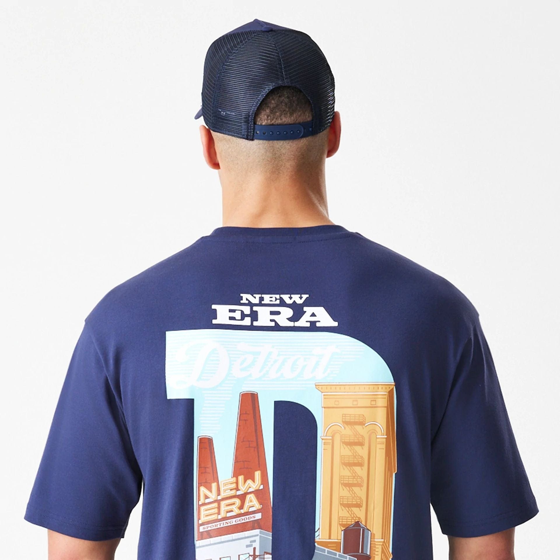 The Male model is wearing  New Era Location Navy Oversized T-Shirt  8