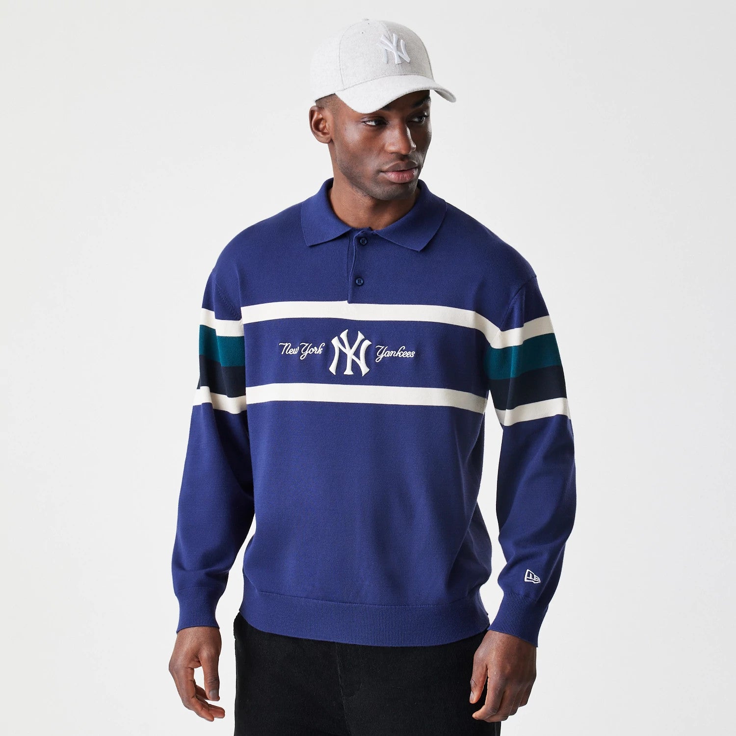 The Male model is wearing New York Yankees MLB Knit Navy Rugby Shirt 3