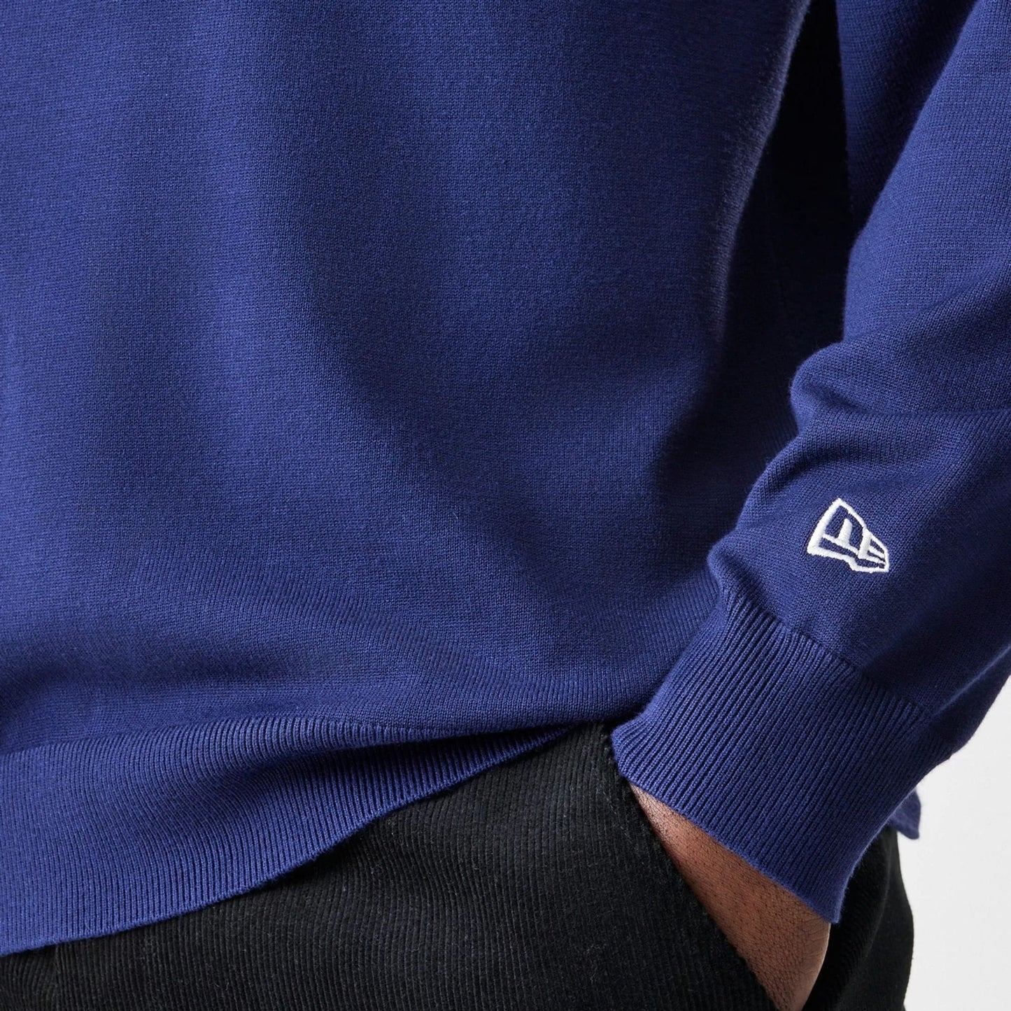 The Male model is wearing New York Yankees MLB Knit Navy Rugby Shirt 7