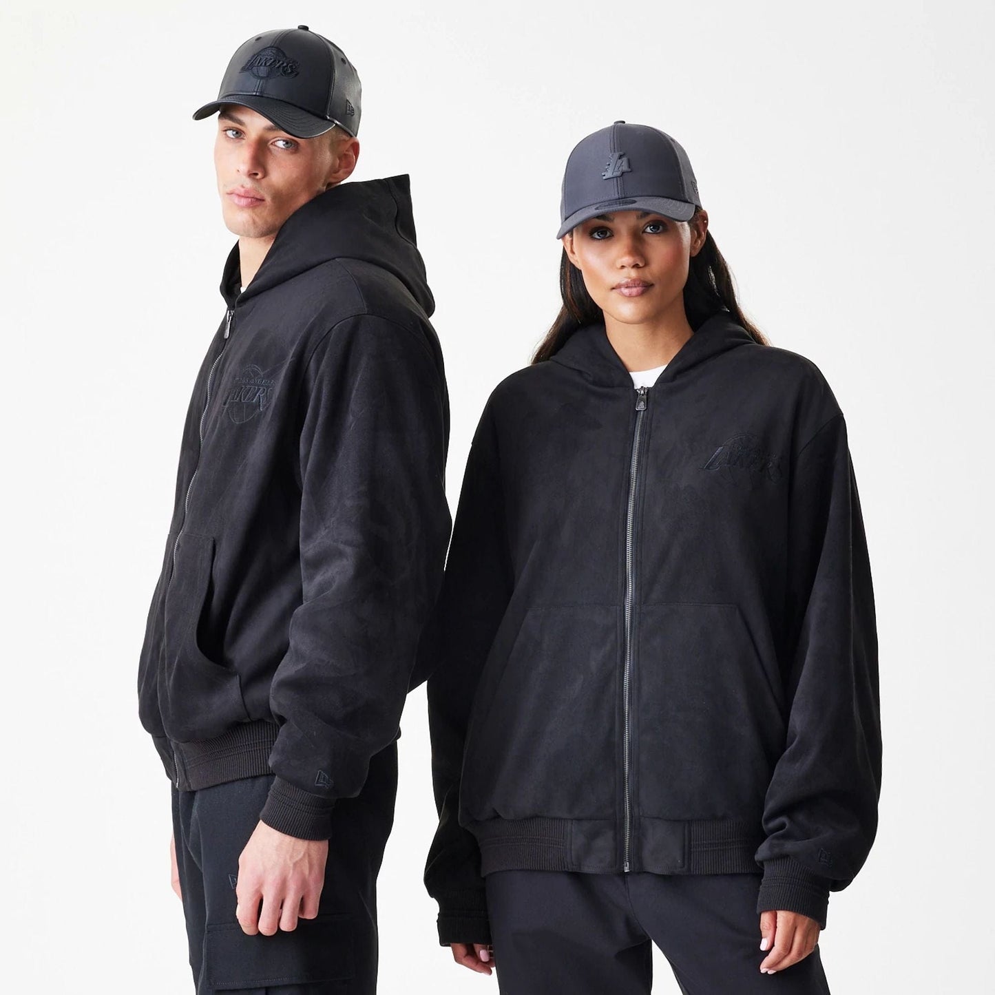 The Male model is wearing LA Lakers NBA Suede Black Hooded Jacket 1