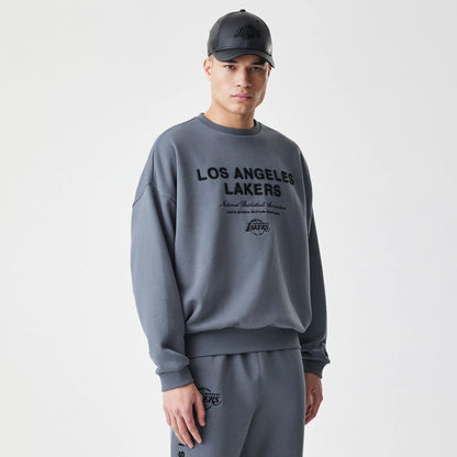 The Male model is wearing LA Lakers NBA Linear Dark Grey Crew Neck Sweater  1