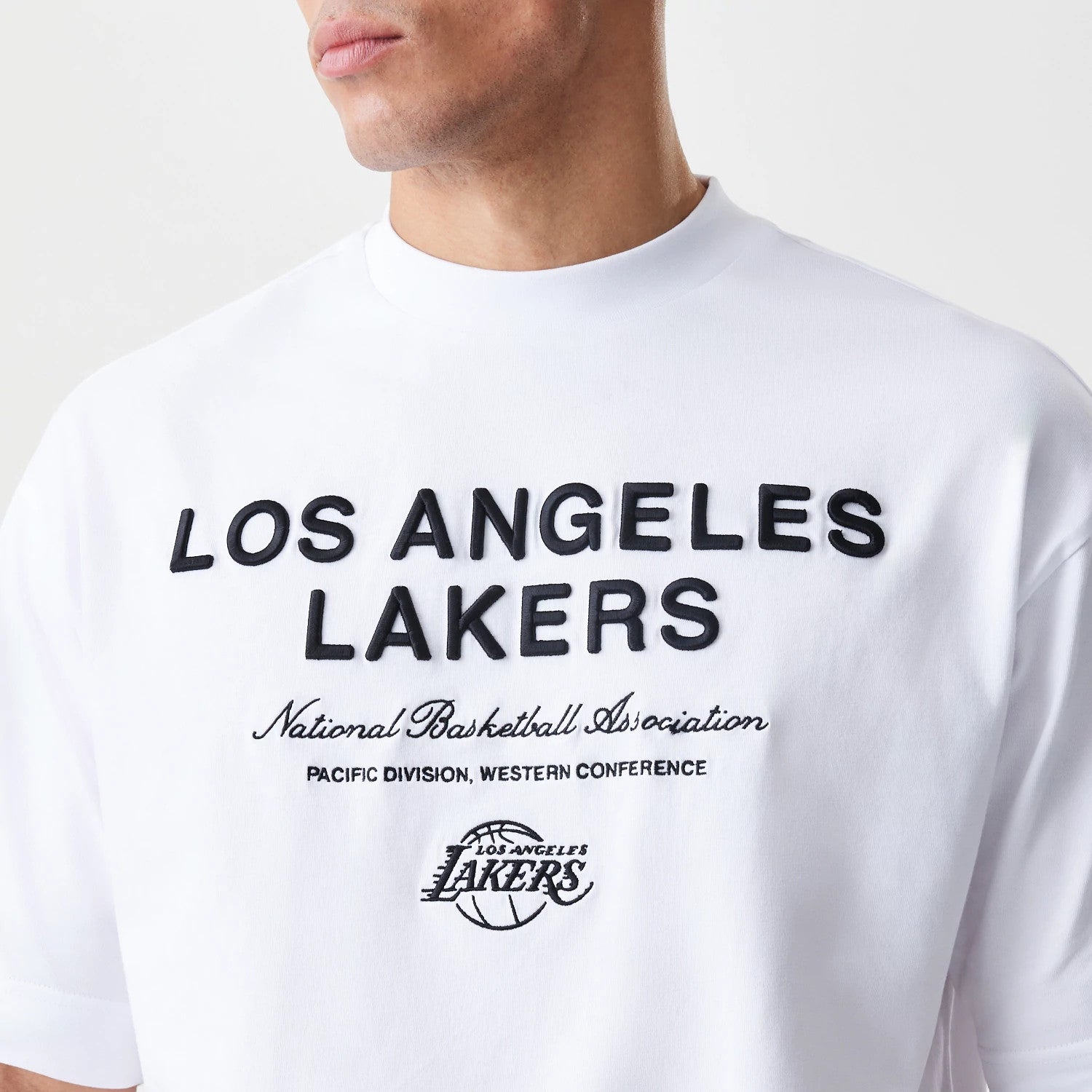The Male model is wearing LA Lakers NBA Linear White T-Shirt 5